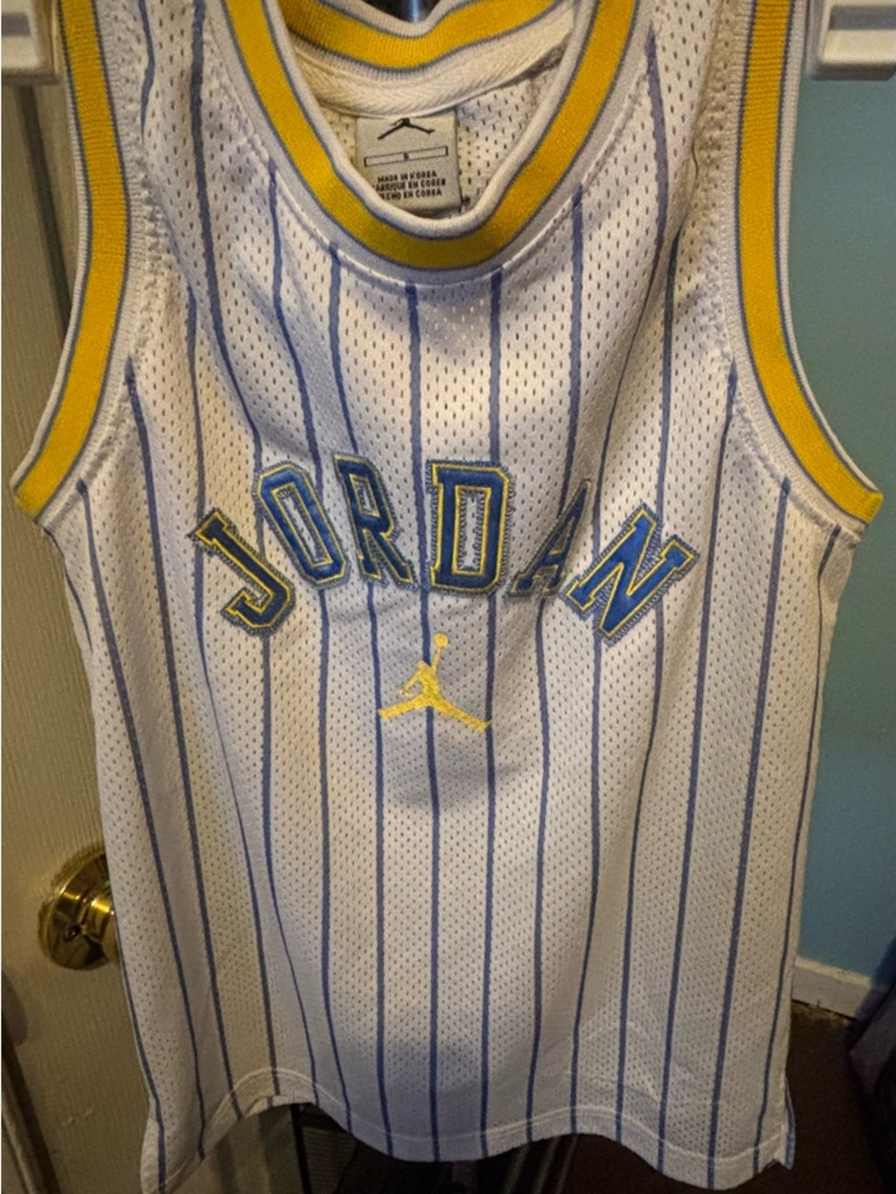Jordan White Pinstriped Basketball Jersey with Yellow & Blue Trim